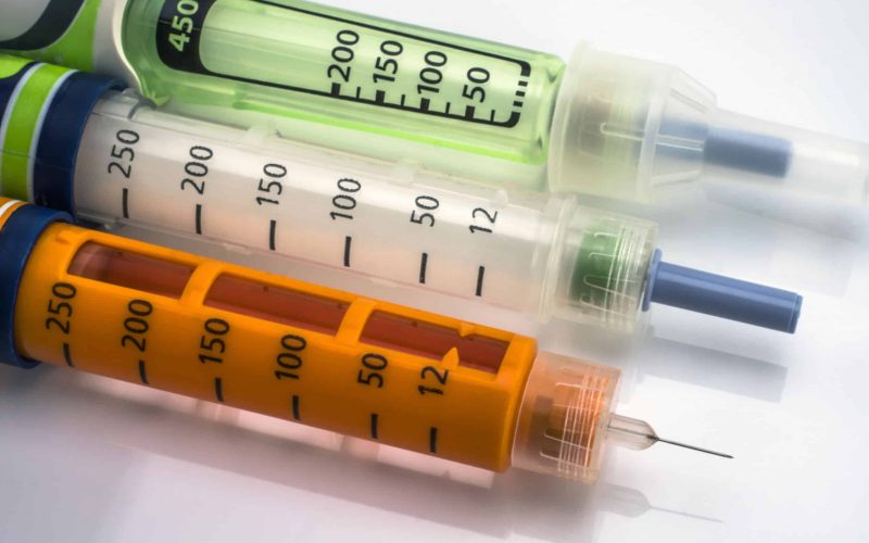 Several Injectors of insulin, conceptual image, composition horizontal
